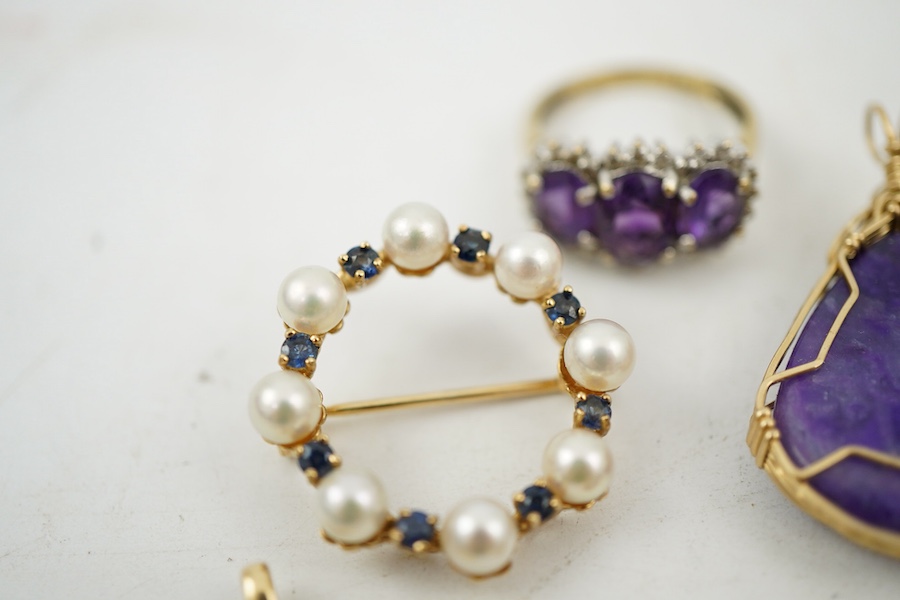 A collection of jewels, comprising: two amethyst and diamond rings; a cultured pearl and circular-cut sapphire wreath brooch; a fire opal pendant, one stone deficient; and a pair of cultured pearl earrings, all mounted i
